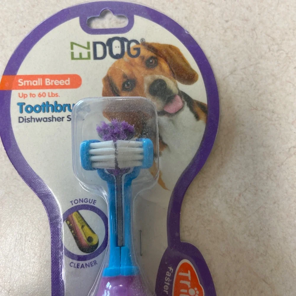 Three doggie toothbrushes NWOT